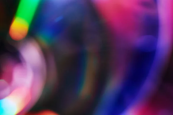 Blurred rainbow colored light flare background. — Stock Photo, Image