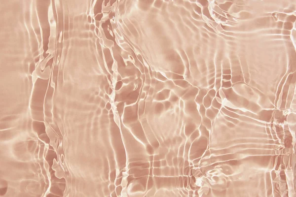 ベージュの水の質感の背景。抽象パターン — ストック写真