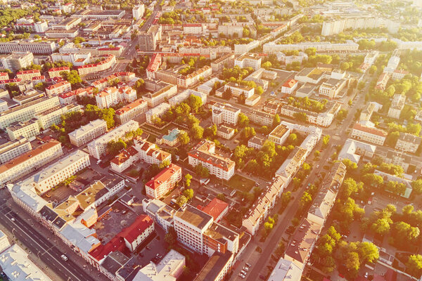 Cityscape of Gomel, Belarus. Aerial view of town architecture. City streets at sunset, bird eye view