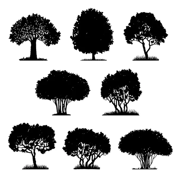 Conjunto de siluetas de árbol — Vector de stock