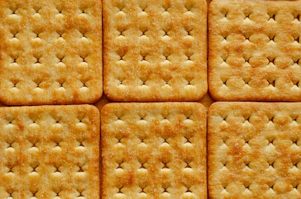 Square Salt Crackers Achtergrond Een Close Van Knapperige Crackers — Stockfoto