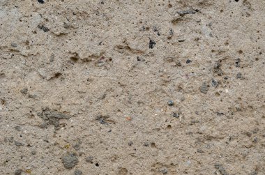 Çoklu görev geçmişi, beton dokusu. Dikkatsizce sıvanmış bir duvarın detaylı görüntüsü..