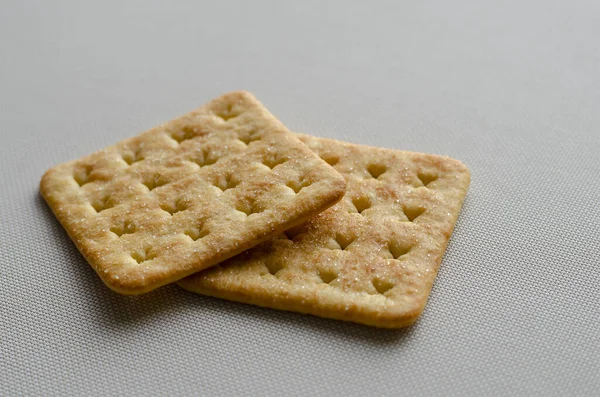 Vierkante Salt Crackers Witte Textuur Achtergrond Zijaanzicht Onder Een Hoek — Stockfoto