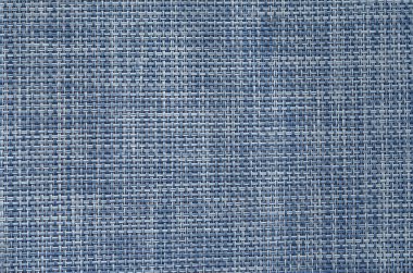 Sentetik kumaş dokusu. Çapraz bağlantılı mavi ve beyaz ipliklerin detaylı görüntüsü. Örülmüş liflerin dokuma deseni.