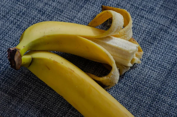 Bitten Banana Next Unpeeled Banana Partially Peeled Half Eaten Ripe — Stock Photo, Image