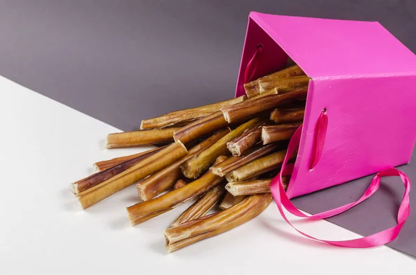 Beautiful Pink Gift Box Pet Treats Bully Sticks Dogs Gray — Stock Photo, Image