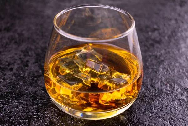 Glass Cognac Ice Black Background — Stock Photo, Image
