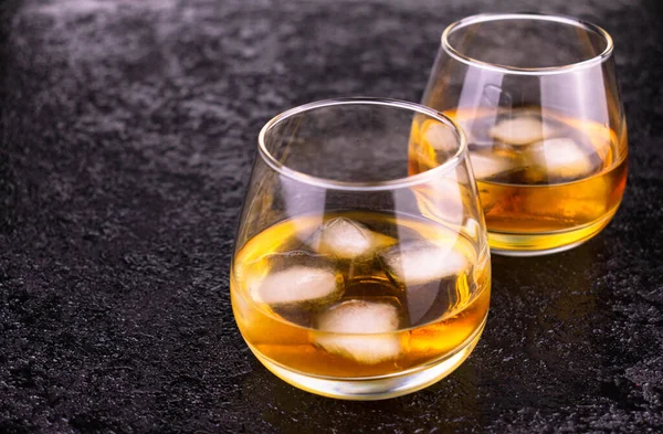 Two Glasses Cognac Ice Black Background Copy Space — Stock Photo, Image