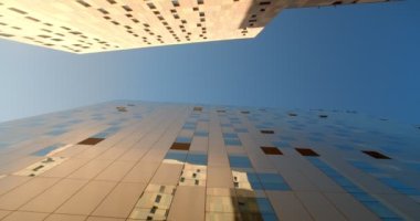 Mavi gökyüzüne karşı güzel, uzun ofis binaları.