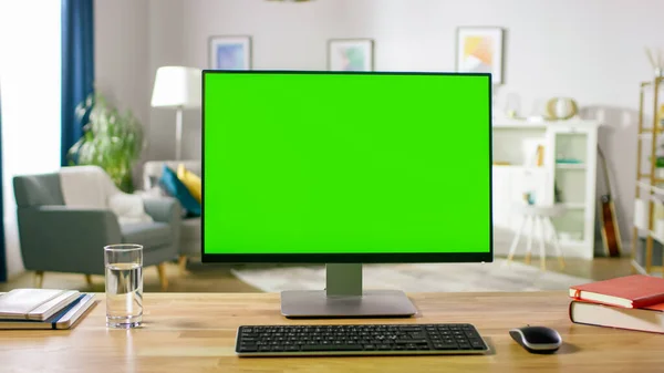 Modern Personal Computer with Mock-up Green Screen Display Standing on the Desk of the Cozy Home Office. Living Room Created by Interior Designer with Good Taste and Style. — Stock Photo, Image