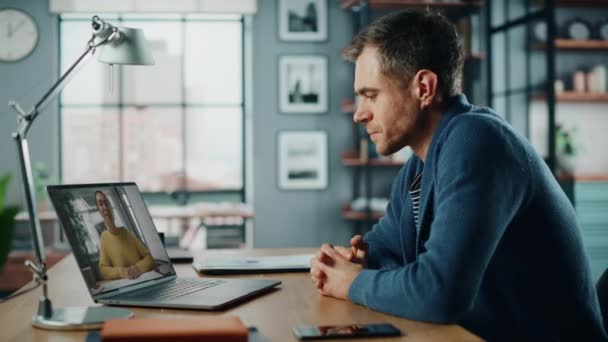 Male with Laptop on Video Call in Living Room — Stock Video