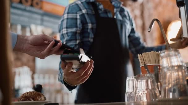 Client Pays for Coffee with NFC Mobile Payment — Stock Video