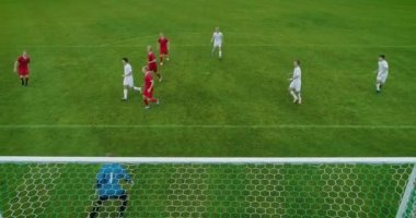 Aerial Shot From Behind the Goals After Successful Pass Player Scores Goal