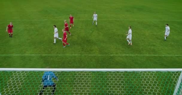 Aerial Shot From Behind the Goals After Successful Pass Player Scores Goal — Stock video