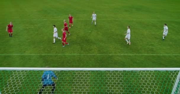 Aerial Shot From Behind the Goals After Successful Pass Player Scores Goal — Wideo stockowe