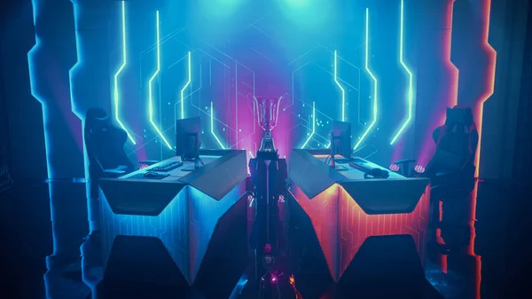 Two Person Empty Computer Gaming eSports Championship Arena with Winner Trophy Standing on a Stage. Stylish Online Live Streaming Tournament with Big Screens Showing Graphics and Neon Stage — Stock Photo, Image