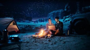 Camping Night Couple Using Laptop