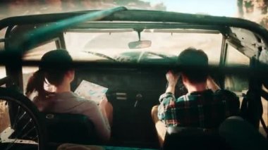 Travelers Riding in Car Desert