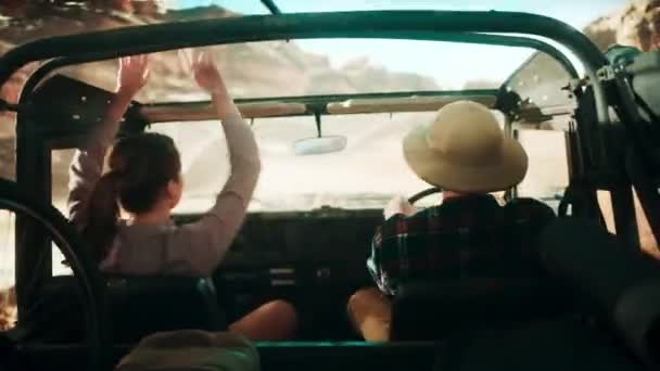 Travelers Riding in Car Desert — Vídeos de Stock