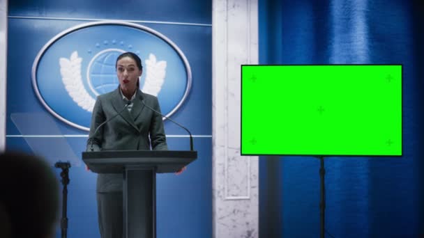 Political Party Female Speaker Talks at Press Conference with Green Screen Display — Stock Video