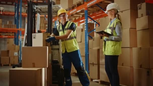 Big Warehouse Female Worker Scans Boxes of Forklift Driver — Stock video