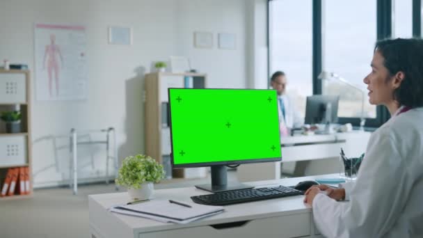 Medical Doctor Makes Video Call on Computer with Green Screen — Stock Video