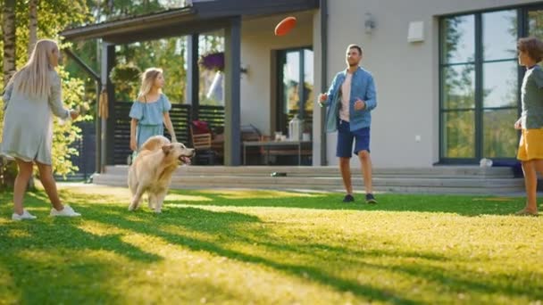 Family Play with Dog in Backyard — Stock Video