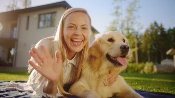 POV Woman Pets Dog Waids in Camera — стоковое видео