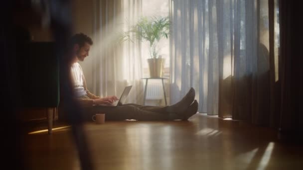 Man Using Laptop at Home — Stock Video