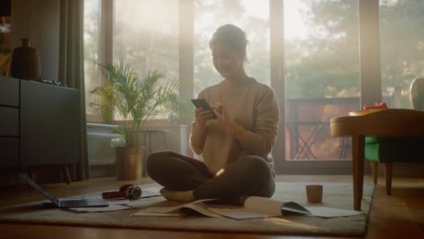 Woman Using Smartphone at Home — Stock Video