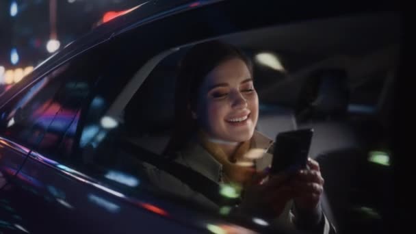 Woman in Car in City at Night — Stock Video