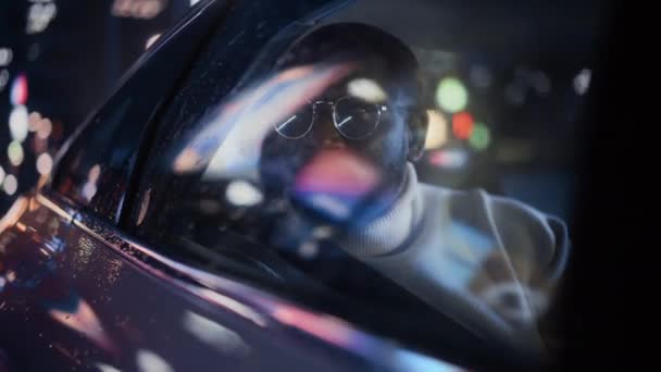 Black Man in Car in City at Night — Stock Video