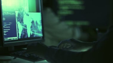 Hacker Team are Working at Night. Quickly Typing Code.