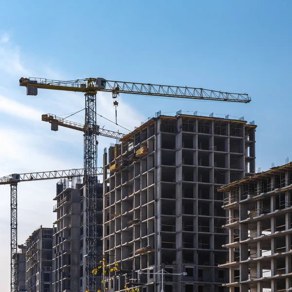 Building cranes on construction Stock Image