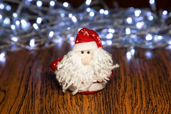 Santa Claus or Father Frost with Christmas lights — Stock Photo, Image