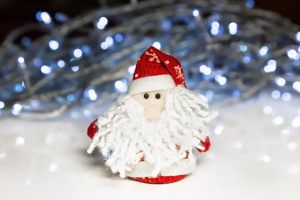 Santa Claus or Father Frost with Christmas lights — Stock Photo, Image