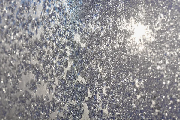 Ice and frost on frozen window — Stock Photo, Image