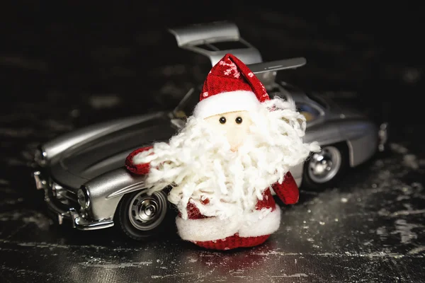 Santa Claus or Father Frost with old retro car — Stock Photo, Image