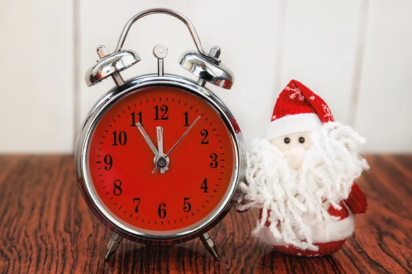 Santa Claus or Father Frost and retro alarm clock — Stock Photo, Image