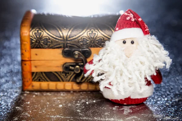 Santa Claus with wooden chest — Stock Photo, Image