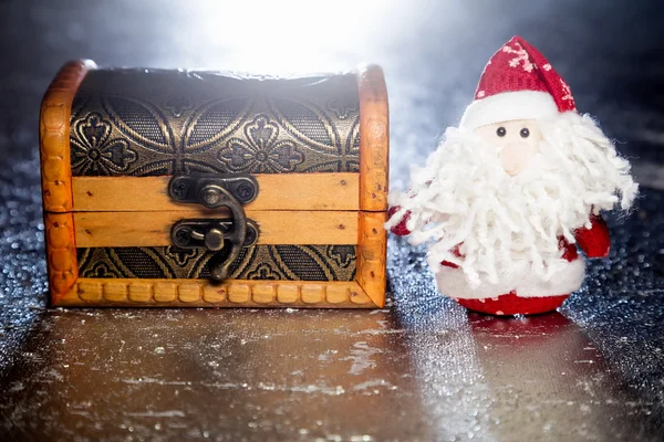 Santa Claus with wooden chest — Stock Photo, Image