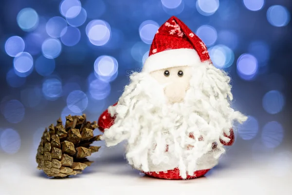 Santa Claus with pine cone — Stock Photo, Image