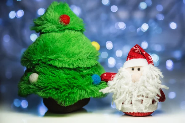 Santa Claus nebo Mrazík a jedle strom — Stock fotografie