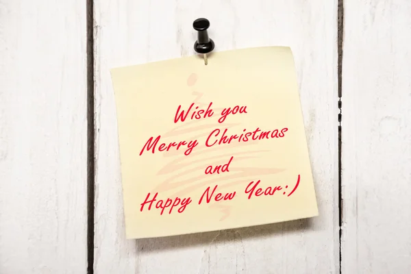 Christmas greeting note paper with pin — Stock Photo, Image