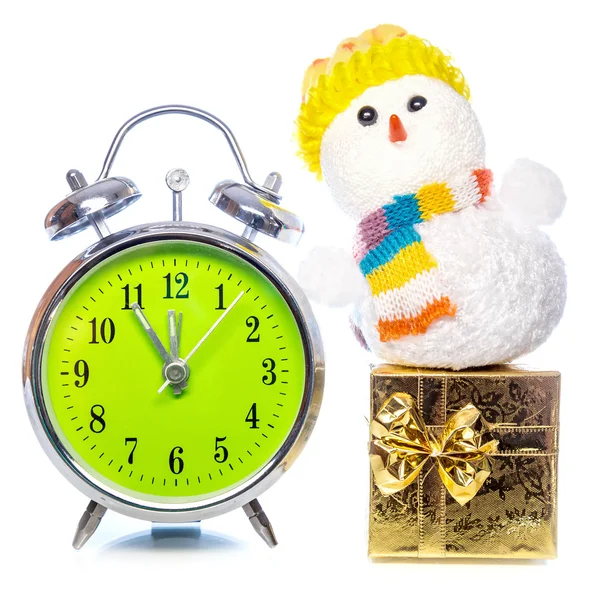 Snowman with gift box and retro alarm clock — Stock Photo, Image