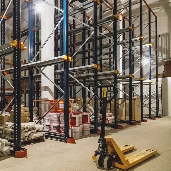 Warehouse interior with empty shelves — Stock Photo, Image