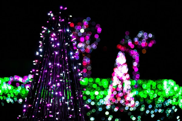 Construction of Christmas Tree from Strings of Garland — Stock Photo, Image