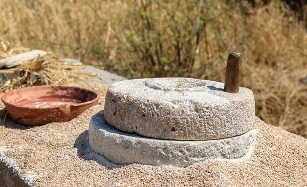 Greek ancient, stone, hand grain mill. — Stock Photo, Image