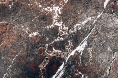 Burgundy mermer taş doku duvarı.