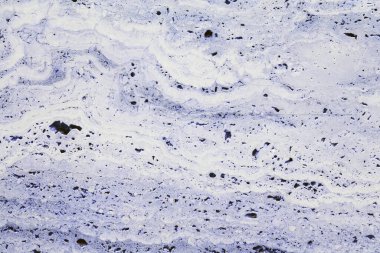 Mavi bir gölgenin doğal taşının dokusu mermere benzer..